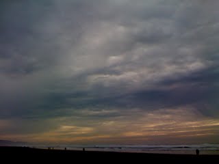 image of cloudy afternoon skies over Ocean Beach, January 10, 2010 by A.E. Graves