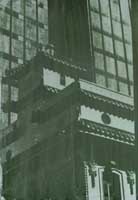 deep green gum bichromate image of building with elaborate Chinese tile roof